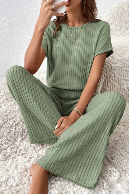 Women Spring Autumn New Collection Solid Color Fine Pit Strip Fashion Shoulder Short Sleeve Knitted Set Top Pants Two Piece Set